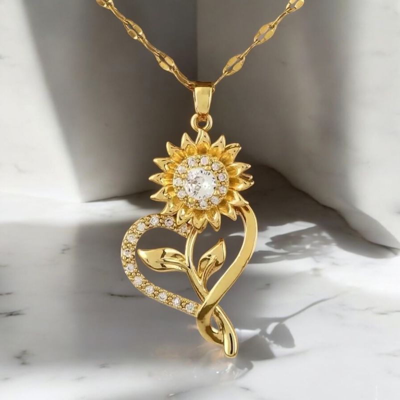 Girasol Heart™ Collar antiestrés de girasol giratorio bañado en oro 18k + anillo ajustable de regalo
