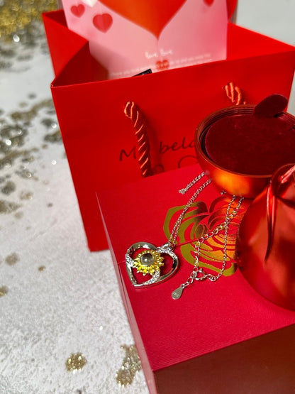 Girasol Megan - Collar te Amo en 100 idiomas en caja de rosa ascendente - Podios