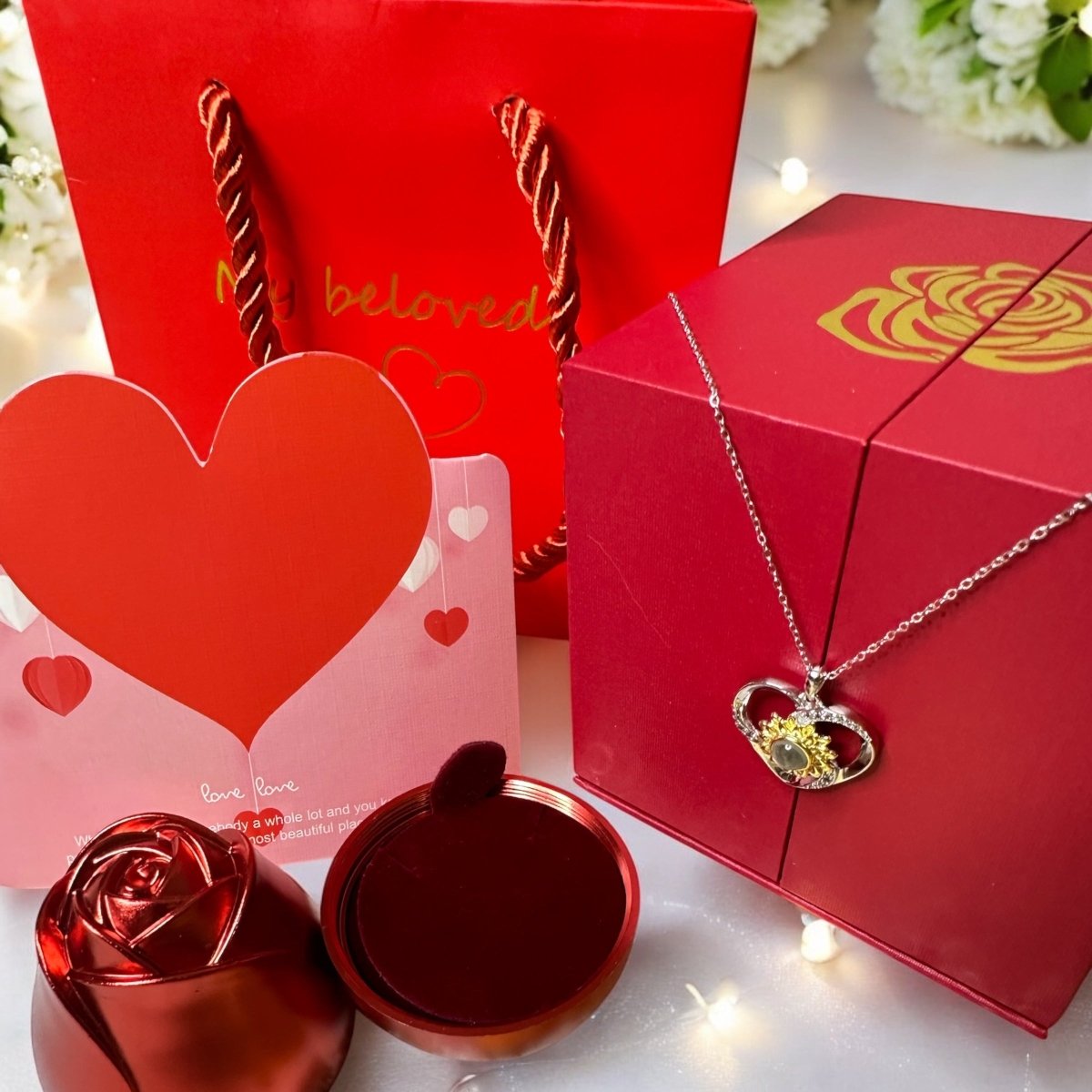 Girasol Megan - Collar te Amo en 100 idiomas en caja de rosa ascendente - Podios